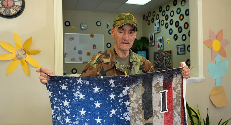 man holding a flag