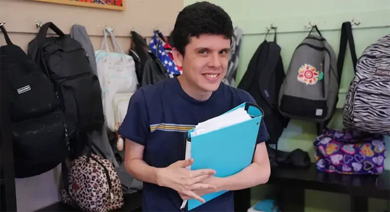 young man with a binder