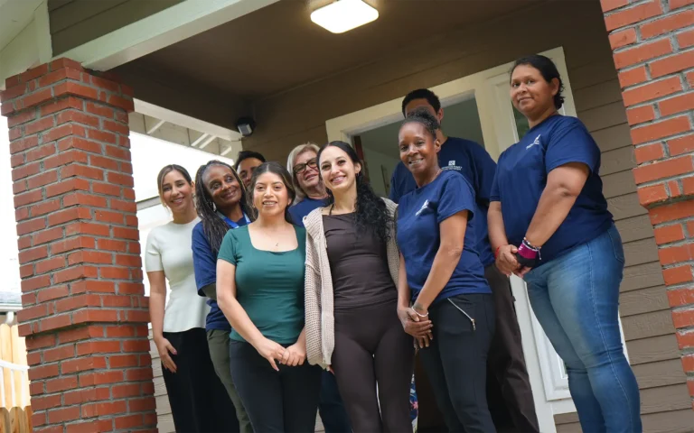 Redwood Family Care Network employees on a porch