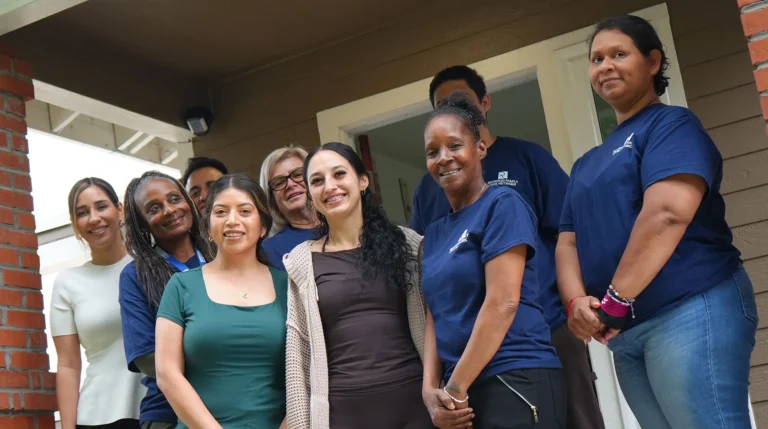 Redwood Family Care Network staff on porch smiling