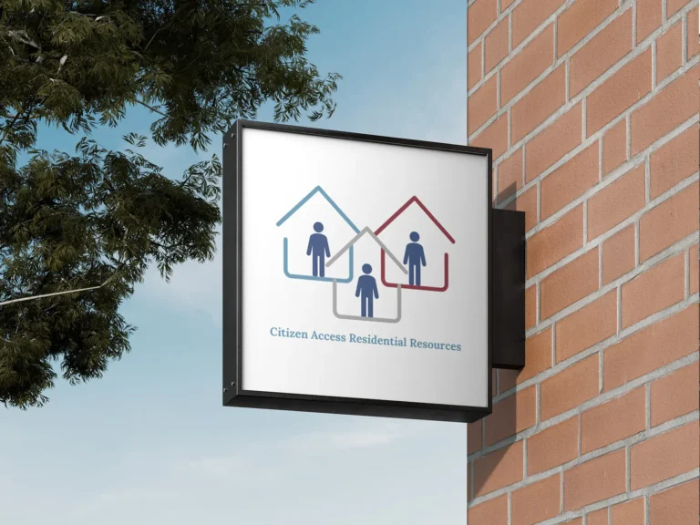 Citizens Access Residential Resources sign outside on brick wall