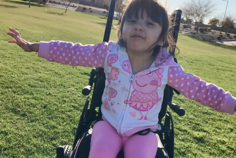 young girl in a wheelchair