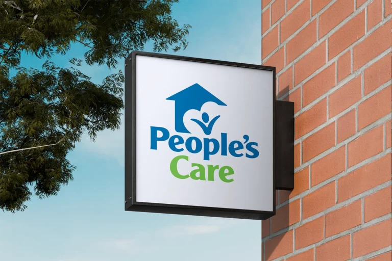 People's Care sign outside on brick wall
