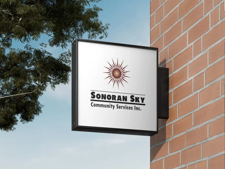 Sonoran Sky sign outside on brick wall