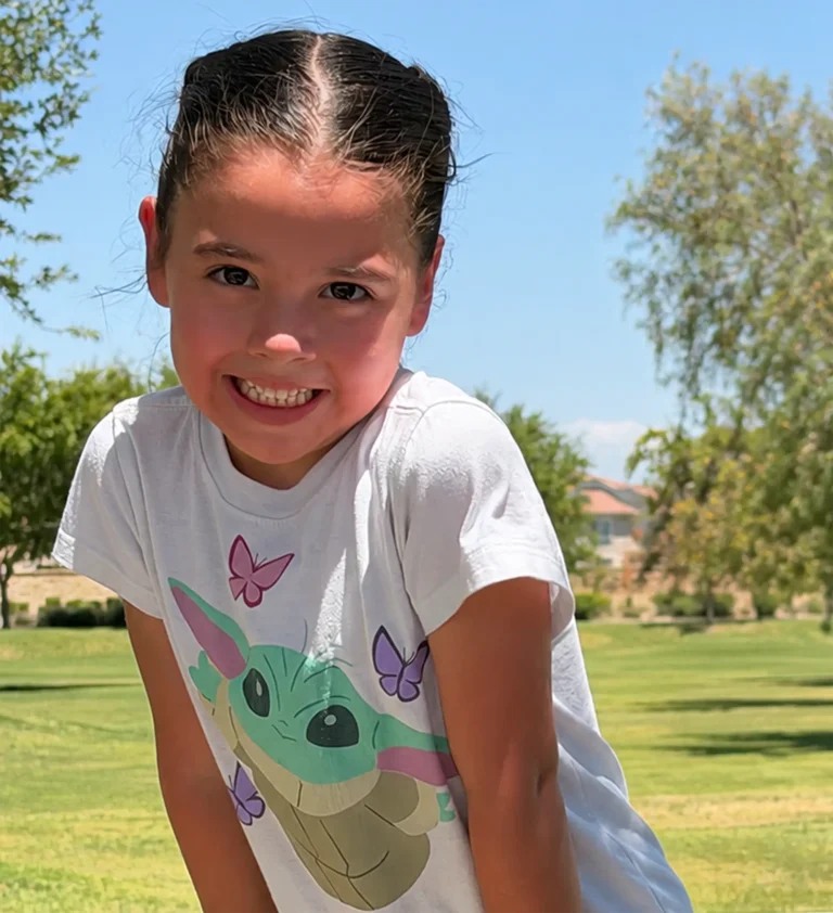 young girl with a big smile